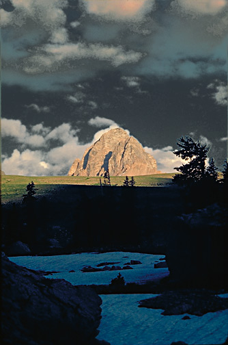 Buck Mountain
11,938 feet, one of the Teton Range's famous Seven Summits, easiest route is via Stewart Draw and the
East Face but this image looks at the scary west face