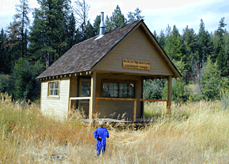 Child absorbing forest fire lookout heritage near Ochoco Ranger Station, Crook County
