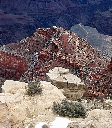 see trail far below on its long way down to Grand Canyon's inner canyon and the Colorado River in the Park